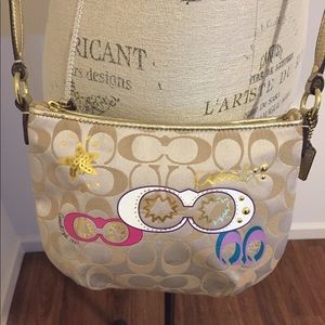 Authentic Coach multi-colored crossbody.